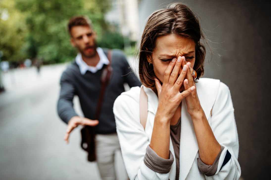 Breakup of couple with man and sad girlfriend outdoor. Divorce, couple, love, pain concept.